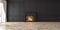 Classic empty black interior with fireplace, curtain, window, wall panels