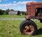 Classic Farming Scene Red Tractor and Barn