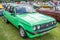 Classic Ford Capri Laser hatchback on display at a public car show