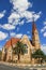 The classic German Lutheran Church of Christ in Windhoek in the setting of palm trees. One of the main attractions of the city