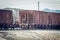 Classic Grain Hopper Train Cars on Tracks