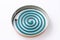 Classic green mosquito coil in a metal plate