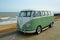 Classic Green and white  VW Camper Van parked on Seafront Promenade.