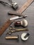 Classic grooming and hairdressing tools on wooden background
