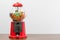 Classic Gumball machine with little toys from circa 60s century