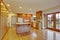 Classic hardwood kitchen with connected living room.