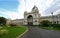 Classic, historic and ornate exterior of Royal Exhibition Building and garden with plants in Melbourne, Victoria, Australia