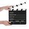 Classic hollywood chalk clapperboard open on a white background