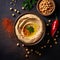 Classic hummus with chickpeas, enhanced by the allure of paprika, olive oil, and traditional oriental spices top-down view