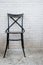 Classic iron chair with white brickbrick