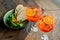 Classic Italian aperitif `aperol stpritz` with ice and with appetizers