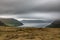 Classic landscape of Faroe islands with cloudy sky