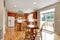 Classic large wood kitchen interior with hardwood floor.