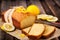 Classic lemon pound cake on rustic wooden background