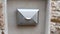 Classic Letter Shaped House Exterior Mailbox post box silver wall background