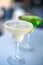 Classic lime margarita cocktail. Very shallow focus image