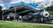 Classic locomotives awaiting boarding by passengers and visitors to the train depot.