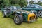 Classic Lotus 7 sports car on display at a public car show