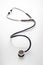 Classic medical stethoscope with one-way head on white