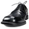 Classic men black club shoe isolated closeup