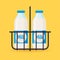 Classic milk bottles in wire carrier. Flat design modern vector