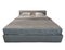 Classic modern bed with gray cashmere bedding. Luxury gray modern bed furniture with patterned bedclothes with shallow