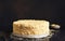 Classic Napoleon cake with custard on a dark concrete background