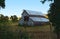 Classic old barn nestled in the foothills, showing a little age.