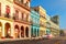 Classic old cars and colorful buildings in downtown Havana