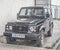 Classic old four wheel drive Suzuki Jimny black parked