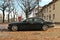 Classic old vintage veteran retro elegant sedan car black Jaguar Sovereign parked