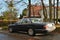 Classic old vintage veteran retro elegant sedan car black Jaguar XJ Executive parked