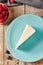 Classic Plain New York Cheesecake on Blue Plate