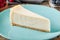 Classic Plain New York Cheesecake on Blue Plate