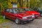 Classic Polish car Polonez Caro parked under autumn trees