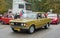 Classic Polish car Polski Fiat 125 driving at a car show