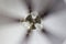 Classic polished brass ceiling fan with light in motion.