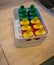 Classic popsicle mold set in freezer container for homemade ice