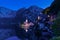 Classic postcard view of famous Hallstatt lakeside town in the Alps on a dusk in the summer, Salzkammergut region, Austria