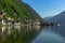 Classic postcard view of famous Hallstatt lakeside town, Austria,Europe. Scenic panoramic view of beautiful town reflecting in