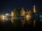 Classic postcard view illuminated historical medieval buildings Rozenhoedkaai Dijver canal belfry belfort Bruges Belgium