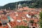 Classic Prague - aerial view to old roof buildings and street ,  Czech Republic