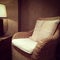 Classic rattan armchair and cozy lamp