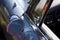 Classic rear mirror on blue car