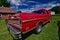 Classic red Ford ranger pickup truck at a summer car show in wisconsin