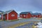 Classic Red Houses In One of the Streets of Traditional Norwegian Fishing Hut Village Hamnoy