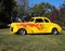 Classic Restored Yellow Car With Flame Detail