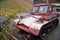 Classic retro vintage antique snowdrive crawler machinery car tractor stop for show on alps mountain in Tschlin Ramosch village at