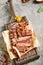 Classic ribeye steak served in waxed paper on wooden cutting board