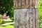 Classic Roman column. Antique decorations close up. Ancient column against blurred background